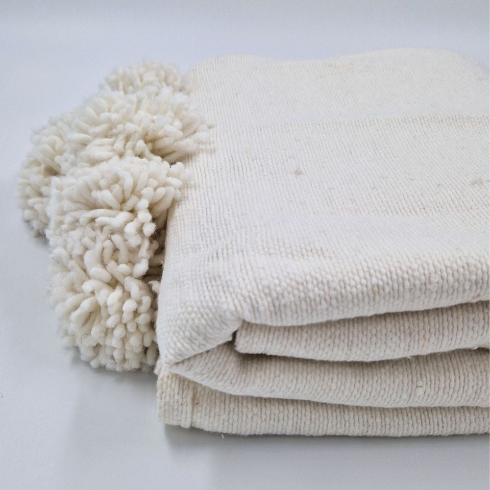 Moroccan Pompom throw blanket for sofa